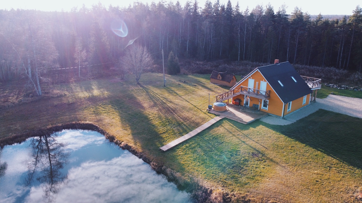 Liis and Ben in Estonian Pihlaka hunting cabin, best holiday homes in Estonia, Eesti Paigad